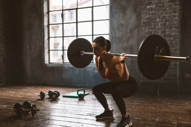 istock female bodybuilder training at the gym 1321359953