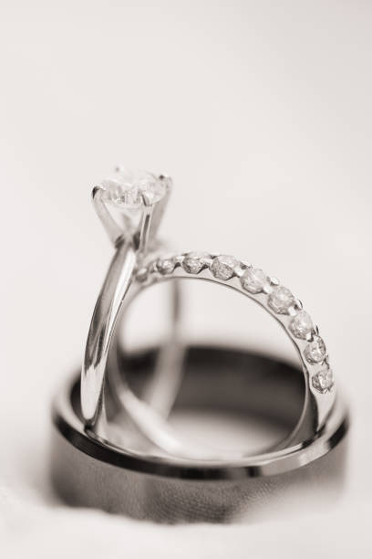 istock Diamond Wedding Rings in Bright Natural Light 1321360577