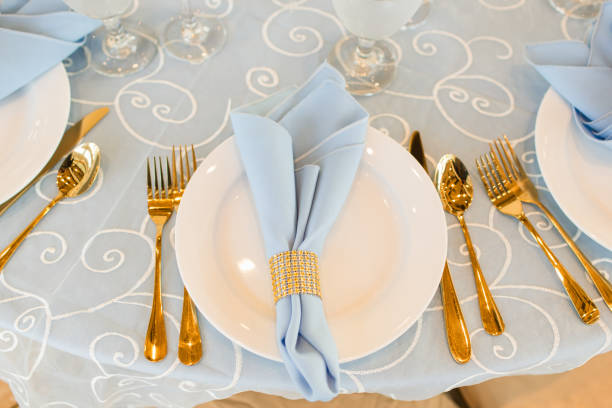 istock Classic Gold, Blue & White Wedding Decor & Table Place Settings 1321360757