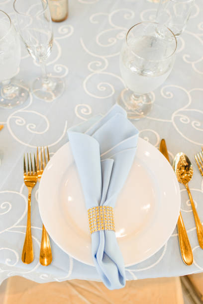 istock Classic Gold, Blue & White Wedding Decor & Table Place Settings 1321360760