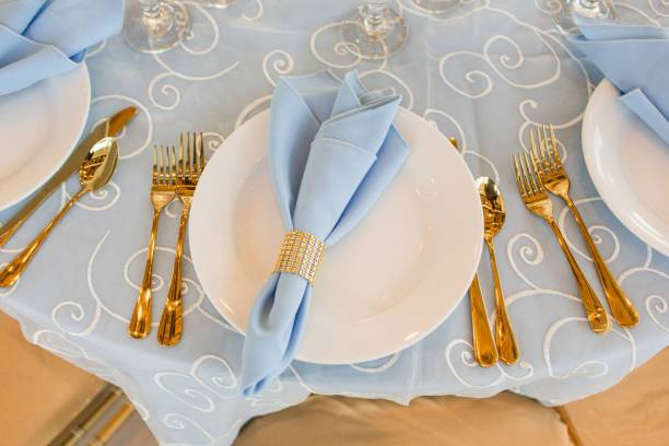 istock Classic Gold, Blue & White Wedding Decor & Table Place Settings 1321361038