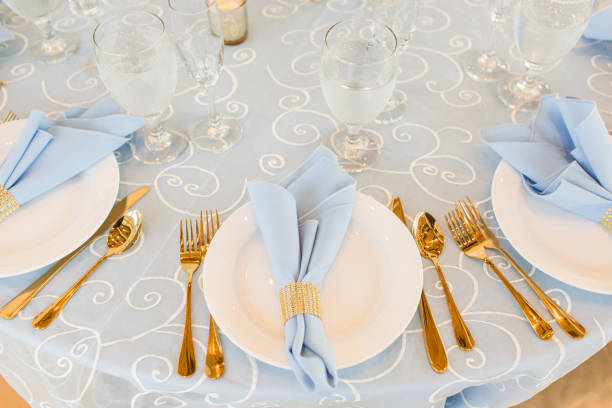istock Classic Gold, Blue & White Wedding Decor & Table Place Settings 1321361176