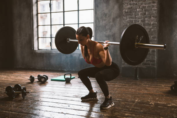 istock female bodybuilder training at the gym 1321361890