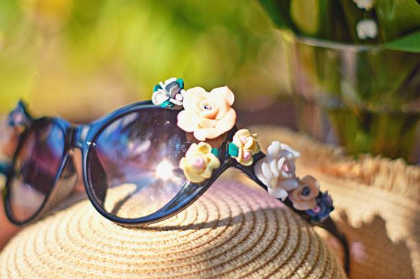 istock Sun hat and sunglasses with flowers 1321362066