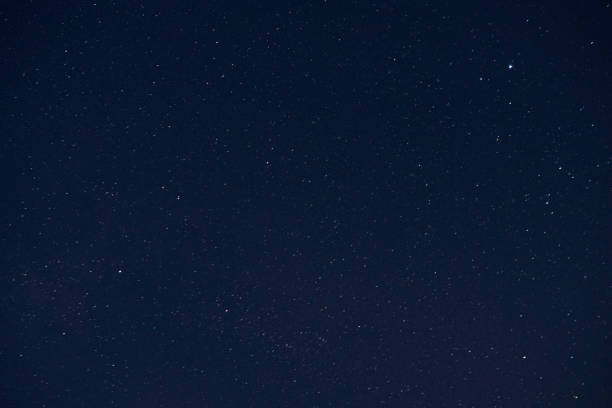 istock Astrophotography blue starry sky in summer at night 1321362072