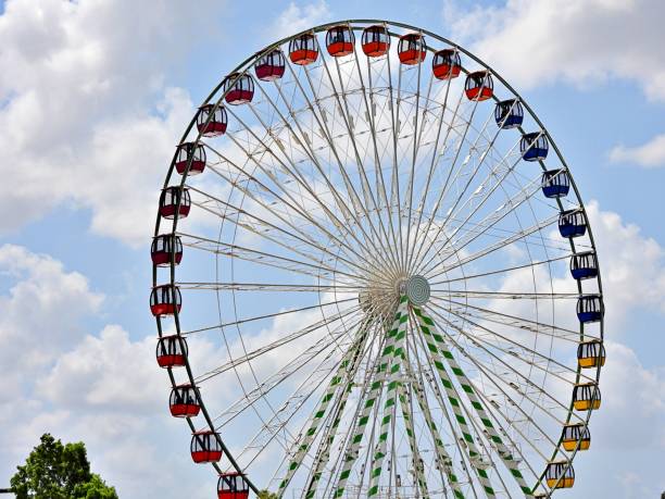 istock Ferris Wheel with a cloud-sky background in Florida 1321362239