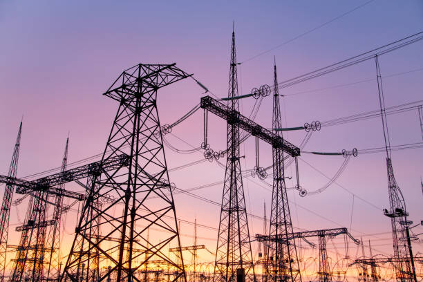 istock An extra-high voltage substation against the backdrop of a pink sunset. 1321368821
