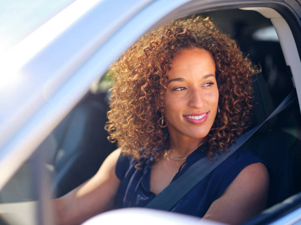 istock Woman Driving Car 1321374637