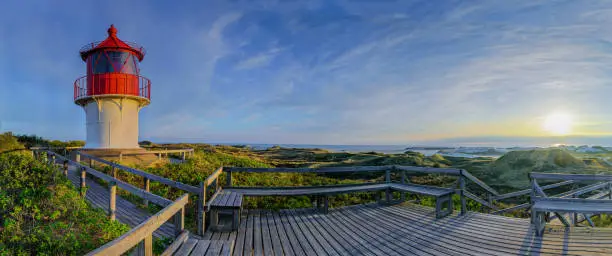 Panorama view of coastal landscape at North sea from orientation and vantage point, Isle Amrum,Schleswig-Holstein, Germany. Stunning view from Wadden Sea coastline with sandy beach.