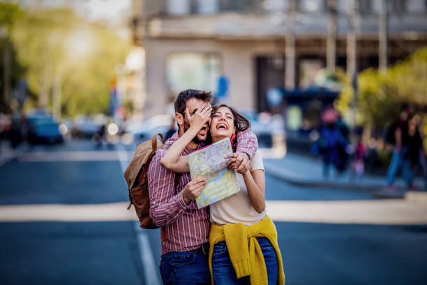 istock Happy couple tourists outdoors exploring city 1321381406