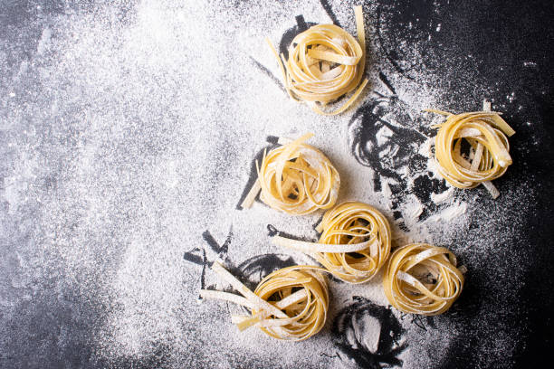 istock Italian fettuccine pasta. Copy space. 1321384062