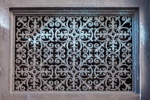 istock Metal grille with an ornate floral pattern 1321387964