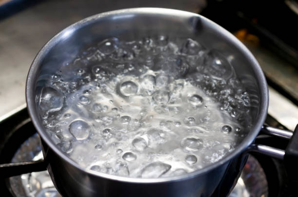 istock Boiling water in stainless pan in kitchen 1321392401