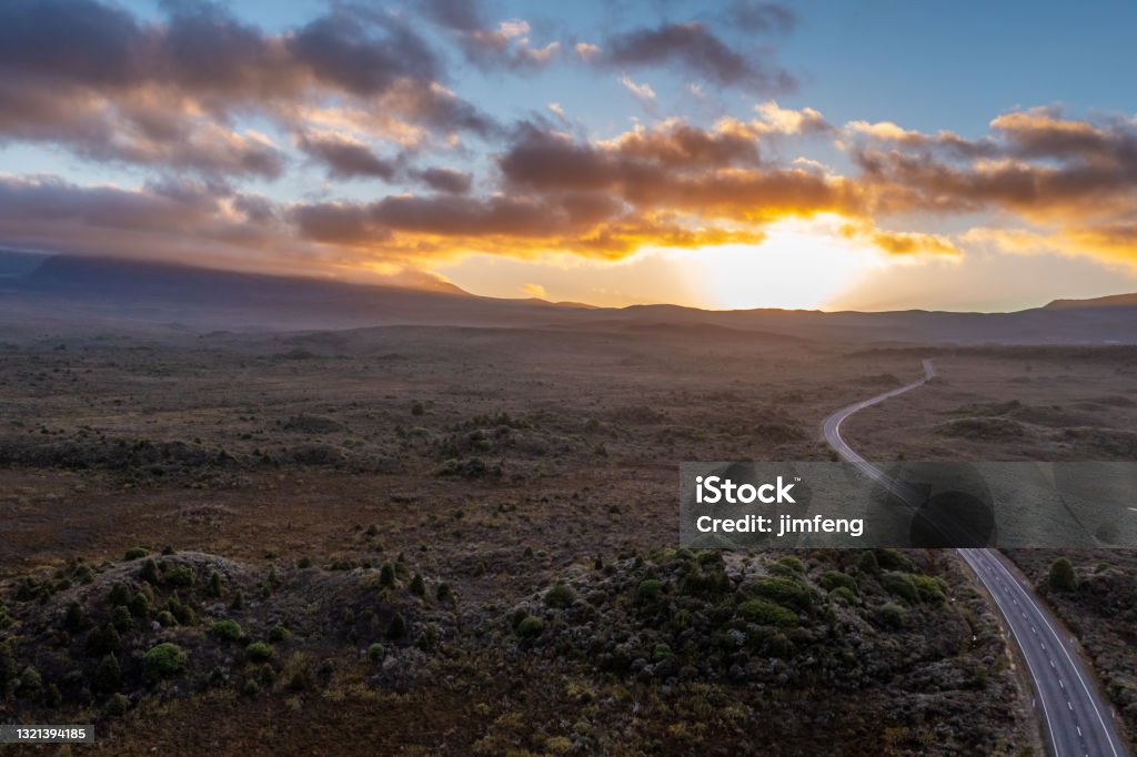 On the road to Mount Ruapehu at dawn, National Park, New Zealand National Park, New Zealand. Sunset Stock Photo