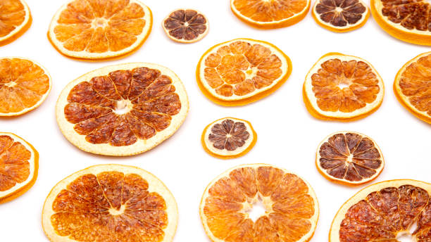 istock mix of different pieces of dried citrus fruit on white background 1321396541