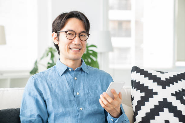 istock middle age man who uses smart phone 1321405685