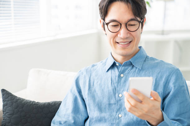 istock middle age man who uses smart phone 1321405725