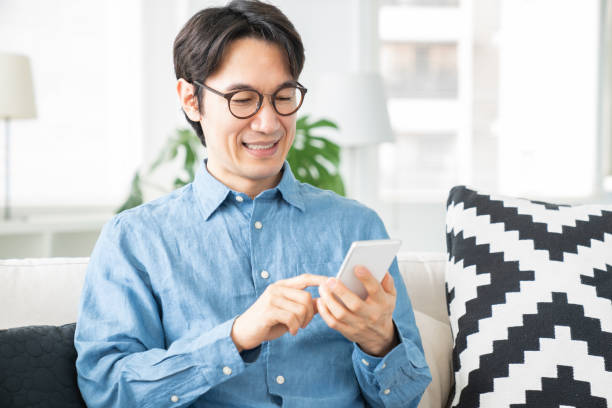istock middle age man who uses smart phone 1321405741