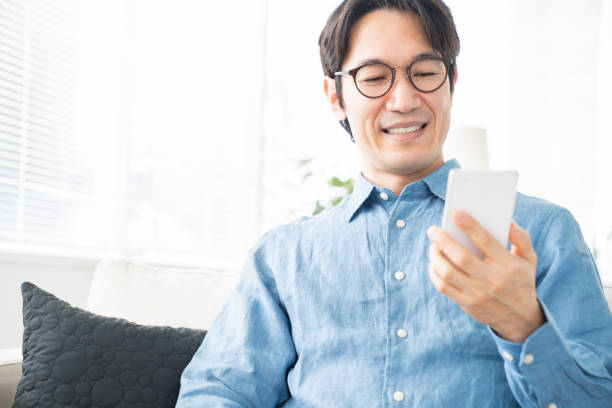 istock middle age man who uses smart phone 1321405765