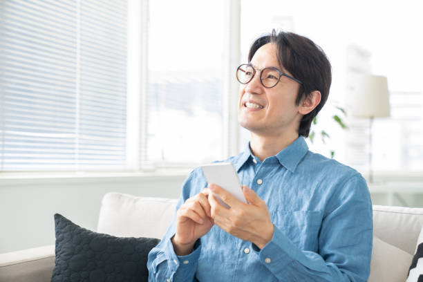 istock middle age man who uses smart phone 1321405774