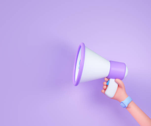 istock Cartoon hand holding megaphone on purple background with copy space. 3d render illustration 1321406463