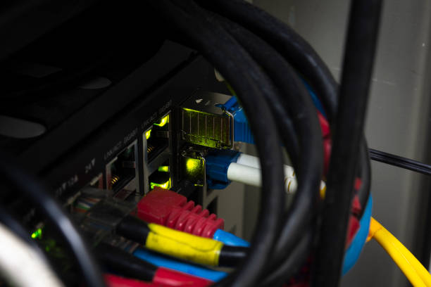 istock Close-up network equipment in server room and Ethernet UTP Cat6 installed in the rack. 1321407694