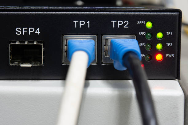 istock Close-up network equipment in server room and Ethernet UTP Cat6 installed in the rack. 1321407699