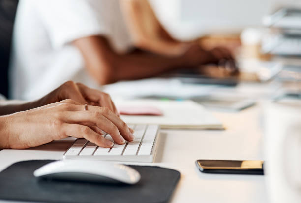 istock Shot of an unrecognisable businesswoman using a computer in a modern office 1321408553