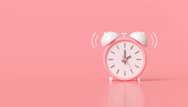 istock Minimal Pink alarm clock on pink background. 3D render illustration 1321409554