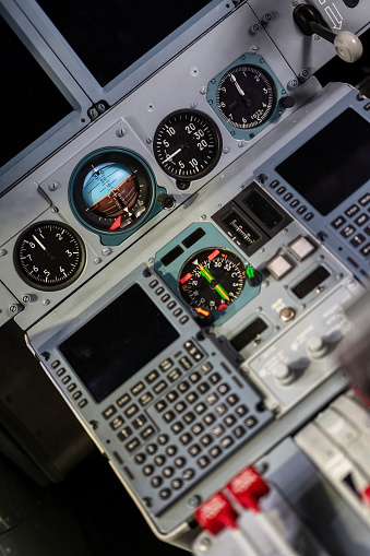 Engine thrust levers. Modern jet aircraft, cockpit.