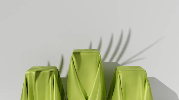 istock 3D Podium with golden cloth and leaves shadow. 3D rendering and podium illustration. 1321412209