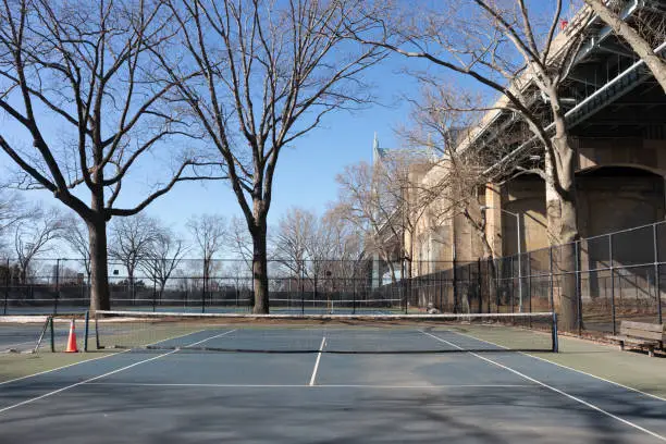 Photo of Empty Tennis Court at Astoria Park in Astoria Queens New York next to the Triborough Bridge