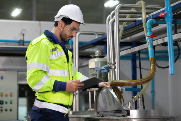 istock engineer or factory worker using tablet computer for how to fixing tanks and pipes in factory 1321415181