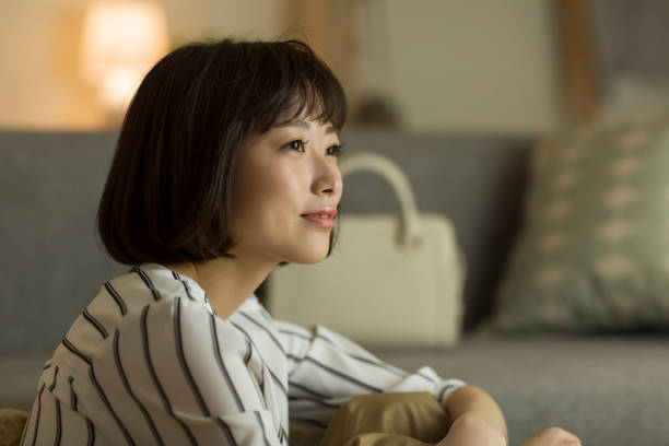 istock Young woman spending time at home 1321416938