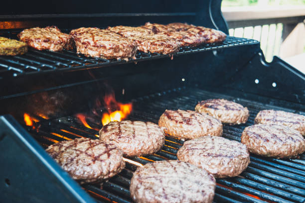 istock Burgers On The Grill 1321418583