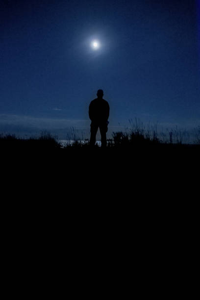 istock Lake reflecting the moonlight of a full moon 1321421644