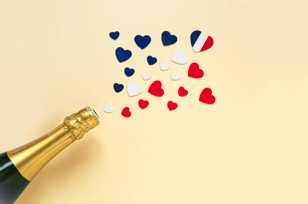 istock French champagne bottle and hearts 1321425283
