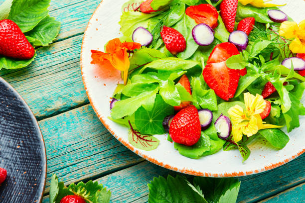 istock Summer salad with berries and herbs 1321432903