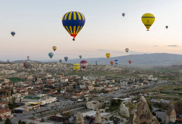 istock Hot air balloons flying in sunset sky Cappadocia, Turkey 1321432921