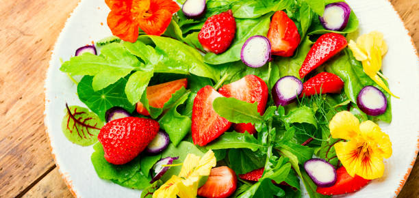 istock Summer delicious salad with berries and herbs 1321432947