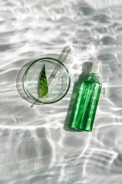 istock Aloe vera gel or serum with sun shadows. 1321434785