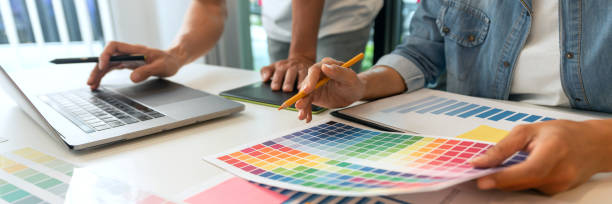 istock two designers discussing on the color tone for the excellent visual work. 1321435154