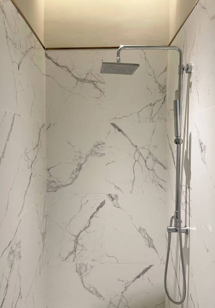 istock luxury marble shower room rain shower 1321435905