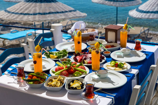 istock Traditional Turkish Breakfast by the Sea in Datca, Turkey 1321436313