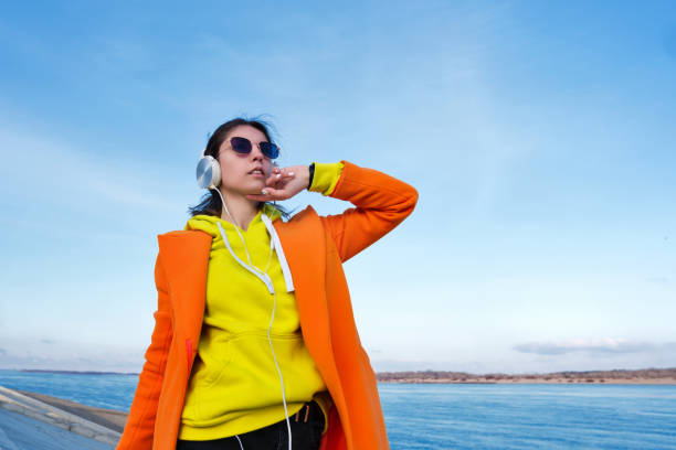 istock Hipster girl beach promenade 1321436320