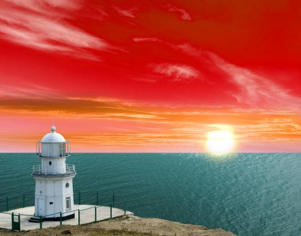 istock lighthouse on marine cape by the evening 1321437098