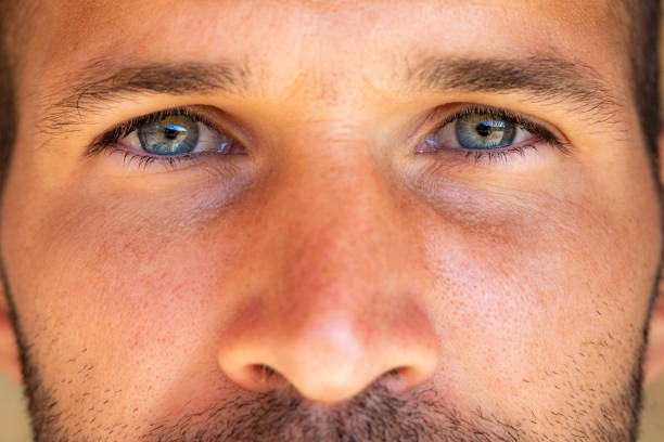 istock Close up of a blue-eyes man. 1321439460