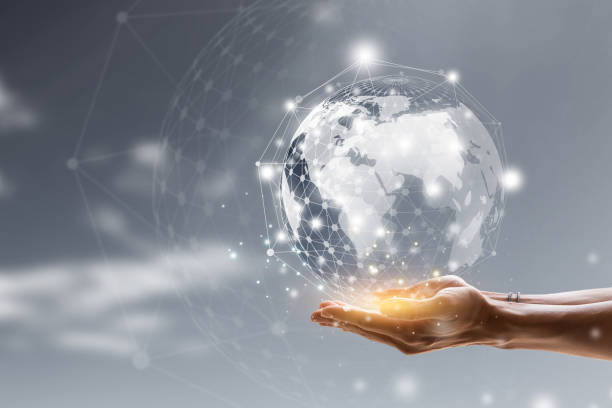istock Businessman holding in hands with global connection concept. Energy saving concept. 1321442034