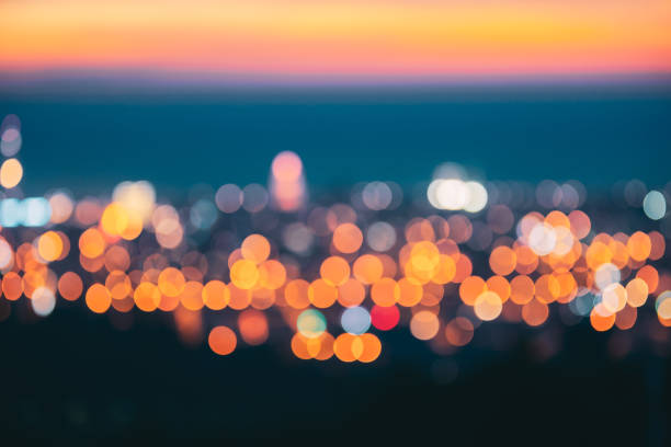 istock Blurred Bokeh Architectural Urban Backdrop. Background With Urban Defocused Lights 1321445283