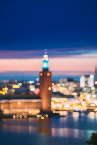 istock Stockholm, Sweden. Night Skyline Abstract Boke Bokeh Background. Design Backdrop. Tower Of Stockholm City Hall 1321445882